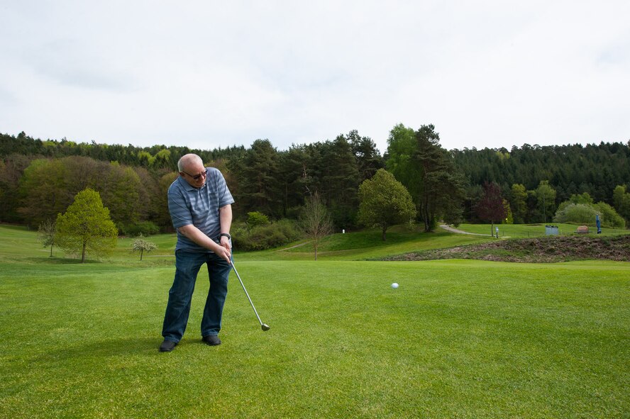 Retired Chief Master Sgt. Charles E. Milam takes a swing during a round of golf at the Golf-Club Pfälzerwald e.V. in Waldfischbach-Burgalben, Germany, May 11, 2017. Milam was awarded the U.S. Air Force Meritorious Service for training over 1,000 security police in 1968 while deployed on his first tour in Vietnam. (U.S. Air Force photo by Airman 1st Class Savannah L. Waters)
