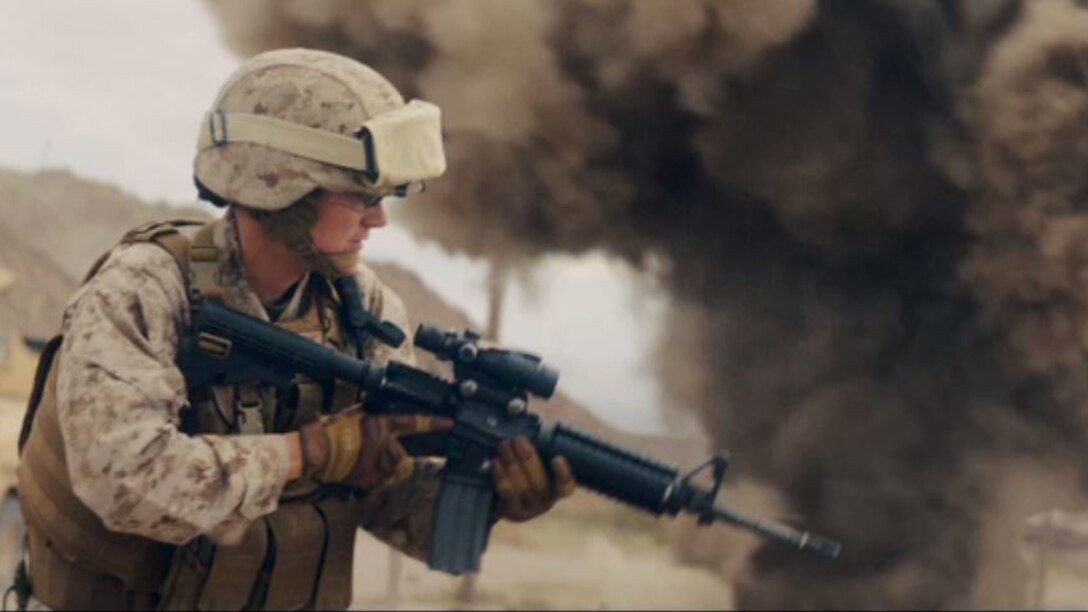 Capt. Erin Demchko portrays a convoy commander engaged in a firefight during the filming of "Battle Up," a new commercial published by the Marine Corps Recruiting Command May 12, 2017. "Battle Up," like the other work in the recently-launched campaign, is aimed at the recruitable population and their influencers – parents, teachers, coaches and community leaders.