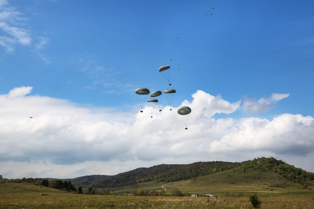 An Air Force C-130 Hercules aircraft drops heavy equipment while conducting a resupply mission during Saber Junction 17 at the Hohenfels Training Area, Germany, May 5, 2017. Army photo by Sgt. Matthew Hulett