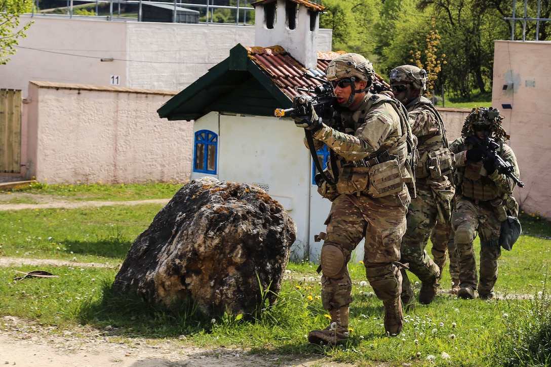 Soldiers maneuver while conducting a town assault exercise during Saber Junction 17 at the Hohenfels Training Area, Germany, May 7, 2017. Army photo by Sgt. Matthew Hulett