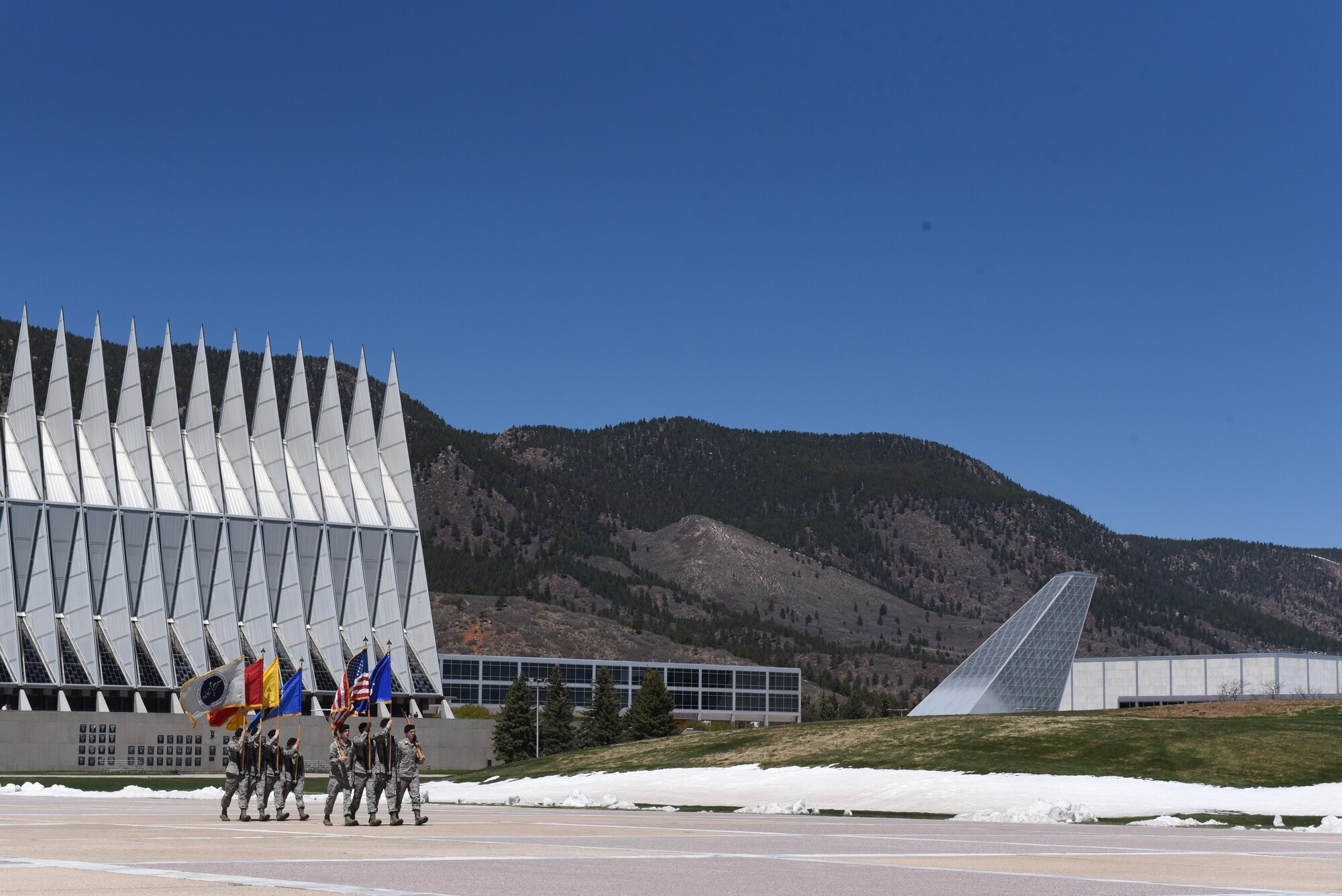 Cadets at The United States Air Force Academy perform drill on their way to the dining facility, May 5, 2017. The cadets perform intricate drill and ceremony prior to lunch.