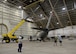 Members from the 97th Maintenance Directorate hoist a vertical fin of a U.S. Air Force KC-135 Stratotanker refueling aircraft, May 10, 2017, Altus Air Force Base, Oklahoma. The maintainers partnered with Tinker AFB to produce the part required to repair the KC-135. This operation has happened only once in the past four years. (U.S. Air Force Photo by Airman 1st Class Jackson N. Haddon/Released).