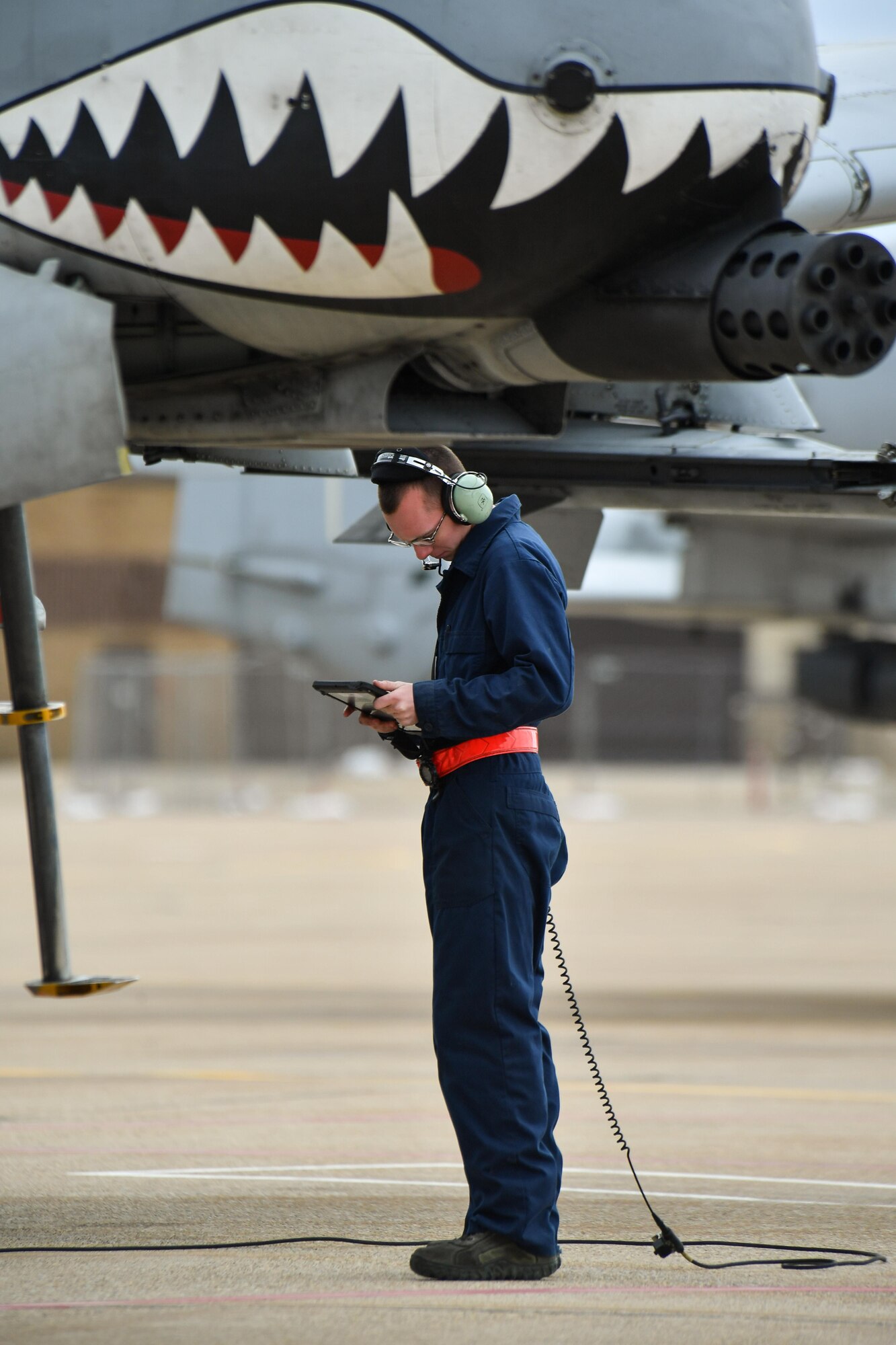 An A-10 Thunderbolt II crew chief assigned to the 23rd Aircraft Maintenance Squadron, Moody Air Force Base, Georgia, performs pre-flight checks May 2 at Hill AFB, Utah. Moody Airmen and aircraft were at Hill AFB participating in the precision-guided air-to-ground weapons evaluation exercise, Combat Hammer. (U.S. Air Force/R. Nial Bradshaw)