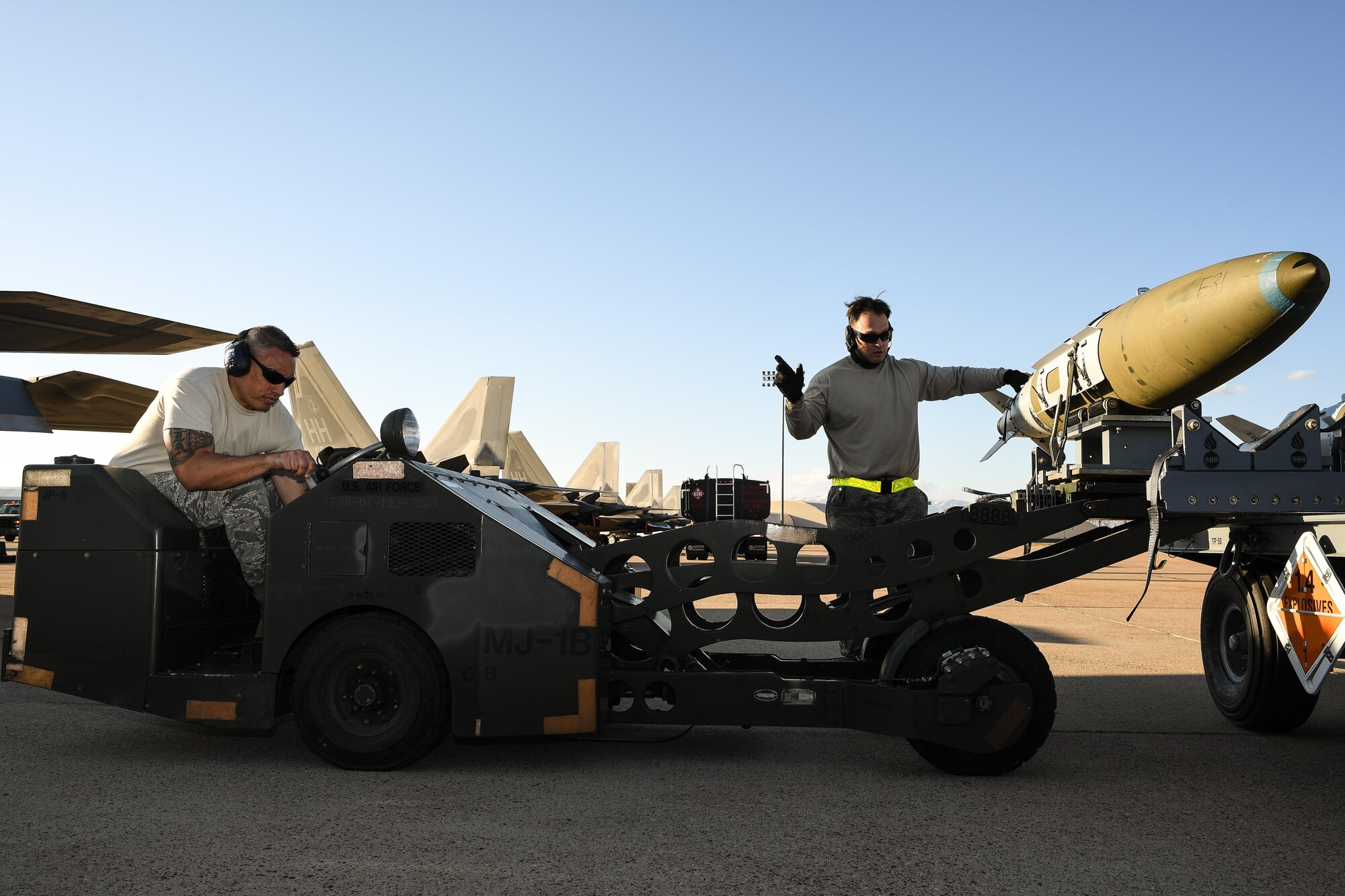 Weapons Airmen from the Hawaii Air National Guard prepare munitions for loading onto F-22 Raptor aircraft May 9 at Hill Air Force Base, Utah. Aircraft and Airmen from Hawaii ANG participated in Combat Hammer, a twice annual precision-guided air-to-ground weapons evaluation exercise conducted at Hill AFB and the Utah Test and Training Range. Other Airmen and aircraft from Moody AFB, Georgia, and Naval Air Station Fort Worth Joint Reserve Base, Texas, also participated. (U.S. Air Force/R. Nial Bradshaw)