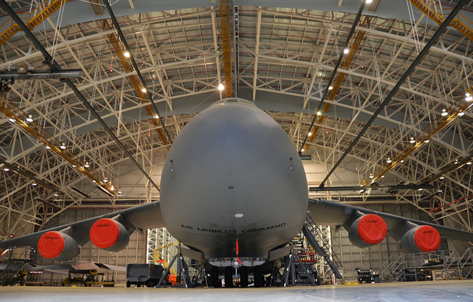 The C-5 Galaxy is an aircraft with an interior and exterior combined paint weight of 2,600 pounds, more than 100 miles of wiring, over 5 miles of control cables and can haul 58 Cadillacs or six standard Greyhound buses. The maintenance demands are extreme. But, the Warner Robins Air Logistics Complex ensures the aircraft is ready when its needed. (U.S. Air Force photo/Tech. Sgt. Kelly Goonan)