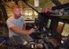 Brad Robinson, functional tester, demonstrates how to rig the throttle inside the C-5 May 3, 2017, at Robins Air Force Base, Ga. (U.S. Air Force photo by Tech. Sgt. Kelly Goonan/released)