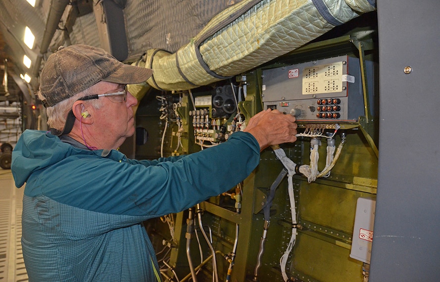 Tom Richardson, electrician, works on the Anti-skid control box inside the C-5 cargo bay May 3, 2017, at Robins Air Force Base, Ga. (U.S. Air Force photo by Tech. Sgt. Kelly Goonan/released)