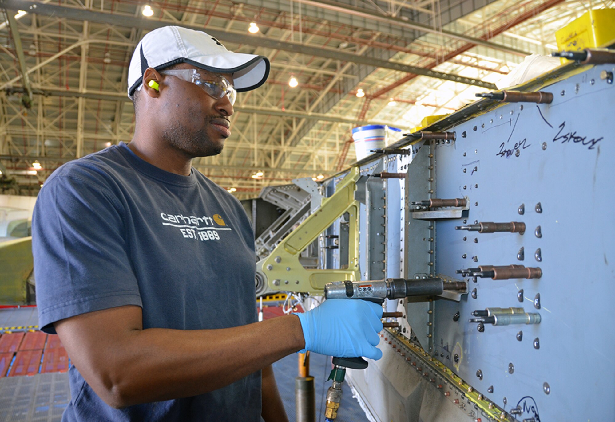 Jermaine Carson, Aircraft Mechanic, manipulates the aileron manifold on the C-5 Galaxy May 3, 2017, at Robins Air Force Base, Ga. (U.S. Air Force photo by Tech. Sgt. Kelly Goonan)