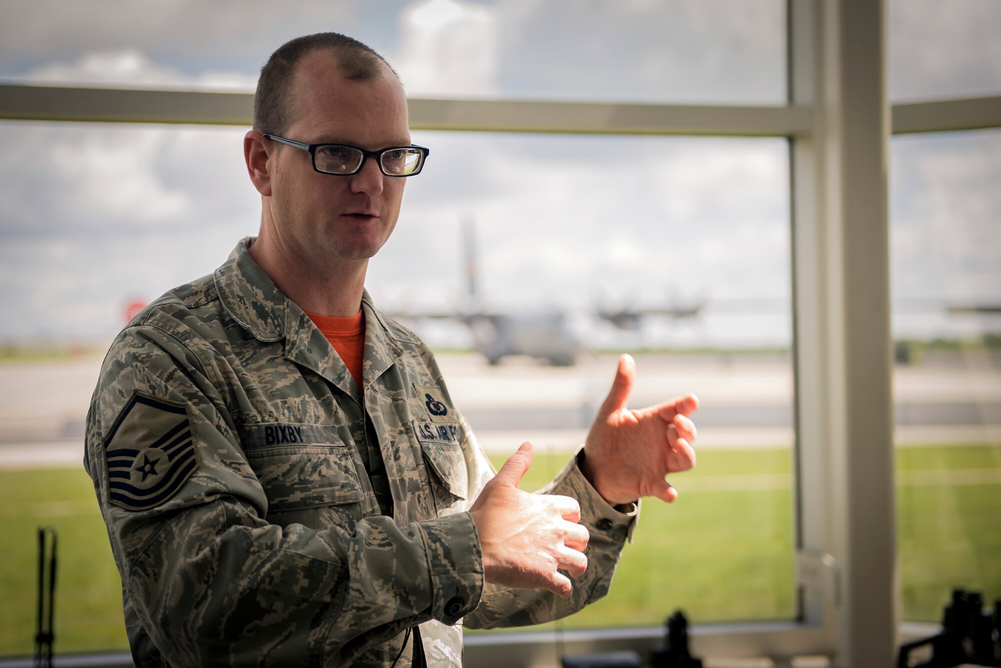 U.S. Air Force Master Sgt. Brent Bixby, the airfield management superintendent with the 182nd Operations Support Squadron, Illinois Air National Guard, explains his job duties in Peoria, Ill., May 6, 2017.  Airfield management specialists are responsible for maintaining safe airfield operating environments for aircrew and aircraft. (U.S. Air National Guard photo by Tech. Sgt. Lealan Buehrer)