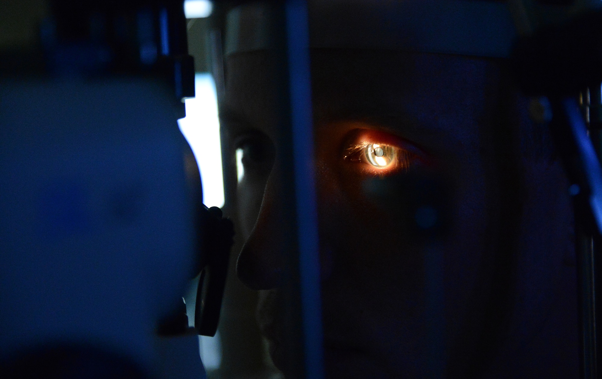 Staff Sgt. William Behl, 62nd Maintenances Squadron crewchief, has his annual eye exam performed at the McChord Field optometry clinic, May 9, 2017, at Joint Base Lewis-McChord, Wash. The clinic provides annual exams and exams for corrective eye surgery, to include photorefractive kerectomy surgery and LASIK surgery. (U.S. Air Force photo/Senior Airman Jacob Jimenez) 
 
