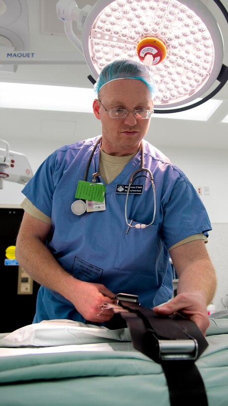 Maj. James O’Neill, 779th Surgical Operations Squadron operating room nurse, preps a surgical table at Joint Base Andrews, Md., May 10, 2017. O’Neill prepares and maintains operating rooms for all surgical procedures on a daily basis. (U.S. Air Force photo by Airman 1st Class Valentina Lopez)