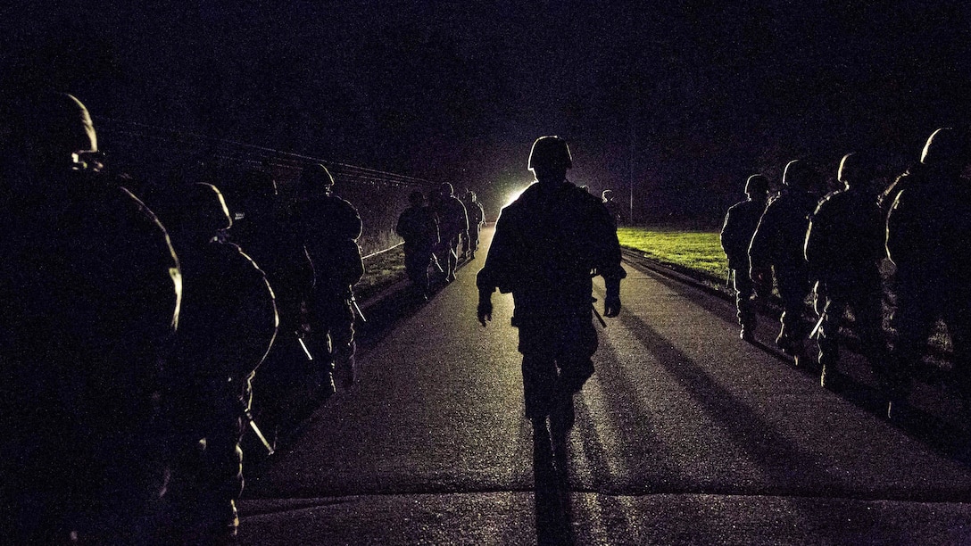 Marines conduct a six-mile training hike at Marine Corps Air Station Beaufort, S.C., May 10, 2017, to satisfy annual requirements and build unit cohesion. The Marines are assigned to Combat Logistics Company 23. Marine Corps photo by Lance Cpl. Christian E. Moreno