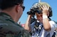 A Tactical Air Control Party Airman interacts with a child during the 2017 Barksdale Air Force Base Airshow, May 6. The show provided a variety of exhibits and demonstrations for the audience. (U.S. Air Force photo/Senior Airman Mozer O. Da Cunha)