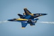 The U.S. Navy Flight Demonstration Team Blue Angels F/A-18 Hornets perform an aerial maneuver for spectators during the Defenders of Liberty Air Show at Barksdale Air Force Base, La., May 7, 2017. The mission of the Blue Angels is to showcase the pride and professionalism of the United States Navy and Marine Corps by inspiring a culture of excellence and service to country through flight demonstrations and community outreach. (U.S. Air Force photo/Senior Airman Mozer O. Da Cunha)