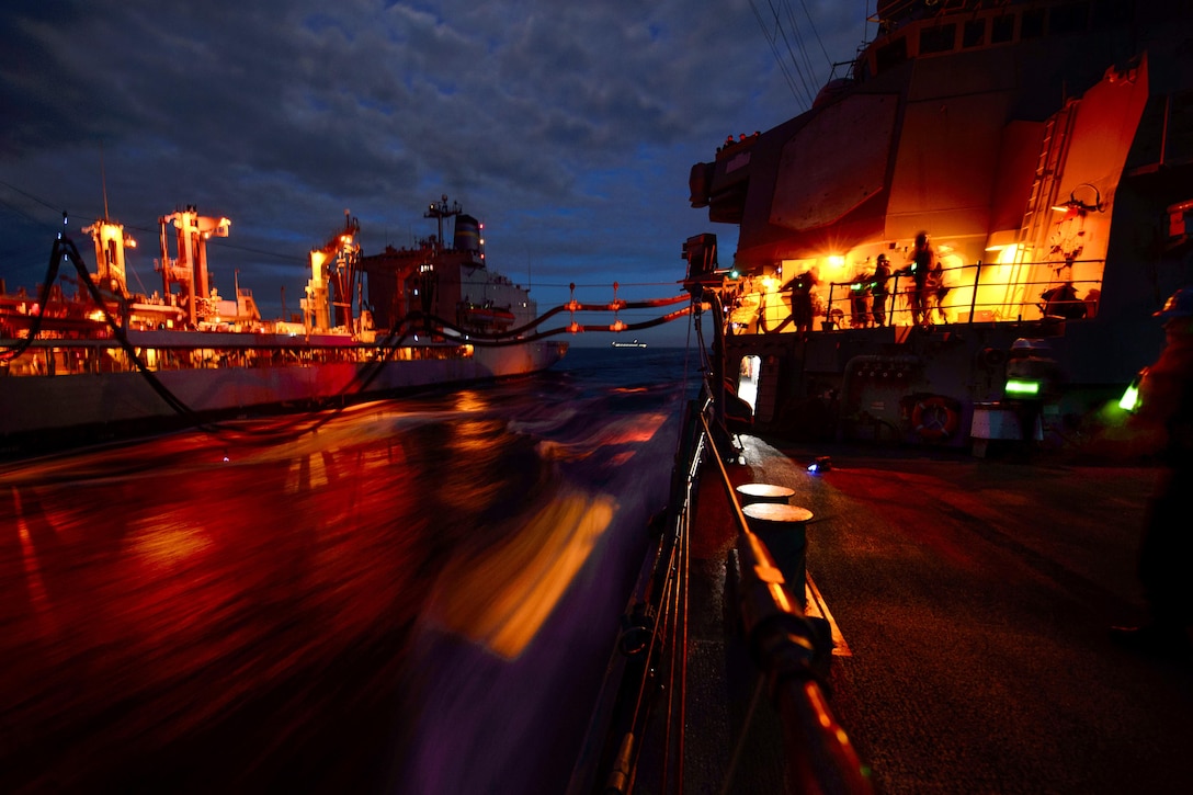 The USS Fitzgerald a conducts a night replenishment at sea with the USNS Pecos in the Sea of Japan, May 5, 2017. The Fitzgerald is on patrol supporting security and stability in the Indo-Asia-Pacific region. Navy photo by Petty Officer 2nd Class William McCann