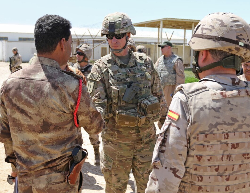U.S. Army Maj. Gen. Martin, the commanding general of Combined Joint Forces Land Component Command-Operation Inherent Resolve, the 1st Infantry Division and Fort Riley, talks with Iraqi soldiers about the importance of the their training during a visit at Besmaya Range Complex, Iraq, April 5, 2017. The Spanish army provides specialist training at Camp Besmaya, one of four Combined Joint Task Force -- Operation Inherent Resolve building partner capacity locations dedicated to training Iraqi security forces. (Photo Credit: Sgt. Anna Pongo)