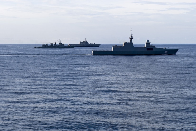 The Singapore navy ship RSS Intrepid, Royal Thai navy ship HTMS Naresuan, and littoral combat ship USS Coronado maneuver off the port side of the guided-missile destroyer USS Sterett during a divisional tactics exercise in support of the Cooperation Afloat Readiness and Training multilateral exercise in the South China Sea, May 11, 2017. CARAT is a series of annual maritime exercises aimed at strengthening partnerships and increasing interoperability through bilateral and multilateral engagements ashore and at sea. Navy photo by Petty Officer 1st Class Byron C. Linder