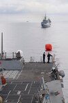 Sailors aboard Arleigh Burke-class guided-missile destroyer USS Sterett (DDG 104) deploy a "killer tomato" target in preparation for Sterett, Republic of Singapore ship RSS Intrepid (FFS 69), Royal Thai Navy ship HTMS Naresuan (FFG 421), and Independence-class littoral combat ship USS Coronado (LCS 4) to conduct a live-fire exercise in support of multilateral exercise Cooperation Afloat Readiness and Training (CARAT). CARAT is a series of annual maritime exercises aimed at strengthening partnerships and increasing interoperability through bilateral and multilateral engagements ashore and at sea. 