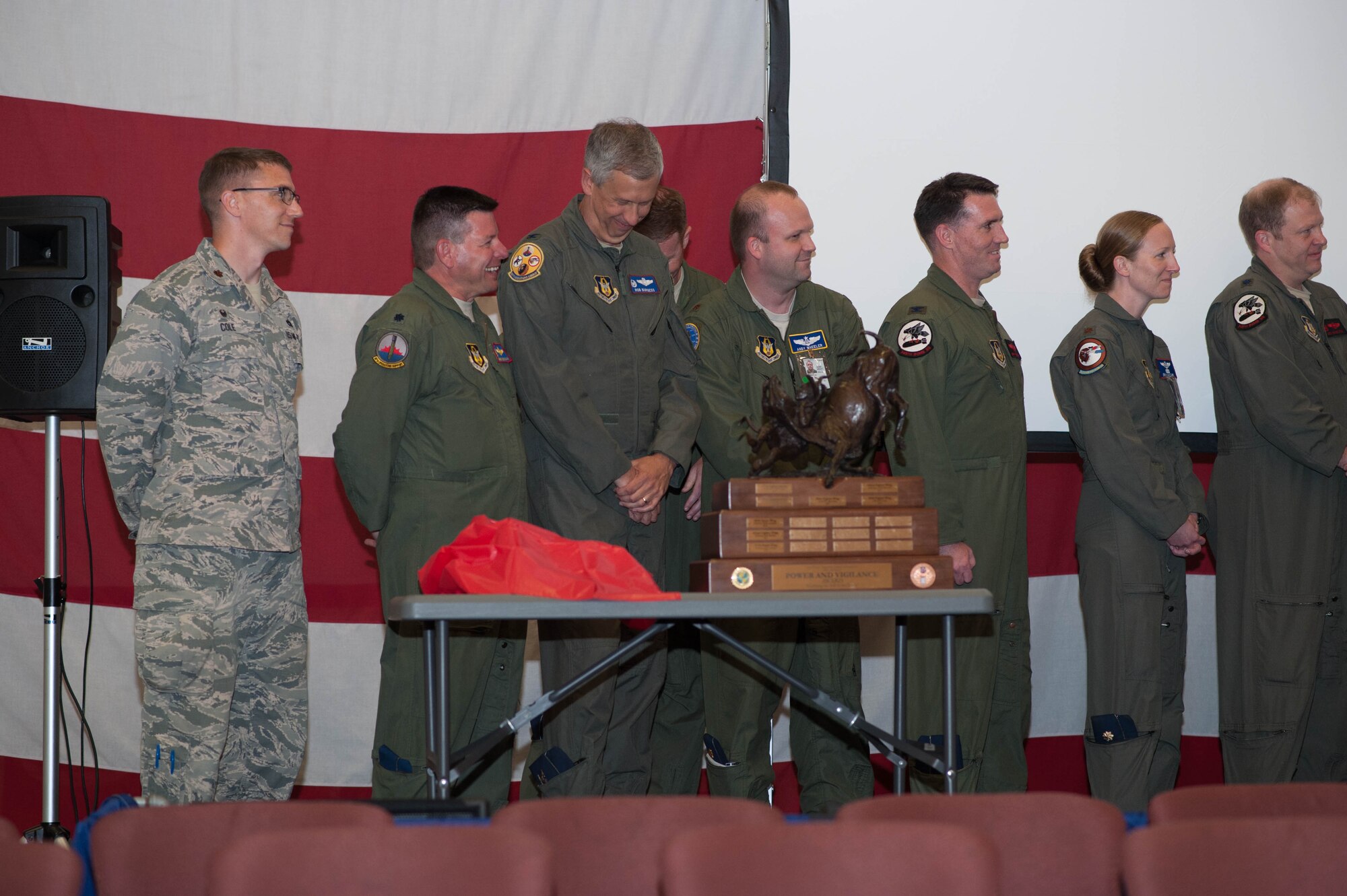 Members of the 307th Bomb Wing celebrate after winning the Tenth Air Force Power and Vigilance Award, which is given to the unit that best exhibits the NAF mission as "the premier provider of affordable, integrated, flexible, and mission-ready Citizen Airmen to execute power and vigilance missions in support of U.S. National security." (U.S. Air Force photo/Maj. Rodney Ellison)