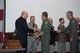 Members of the 307th Bomb Wing celebrate after winning the Tenth Air Force Power and Vigilance Award, which is given to the unit that best exhibits the NAF mission as 