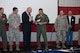 Members of the 307th Bomb Wing celebrate after winning the Tenth Air Force Power and Vigilance Award, which is given to the unit that best exhibits the NAF mission as 