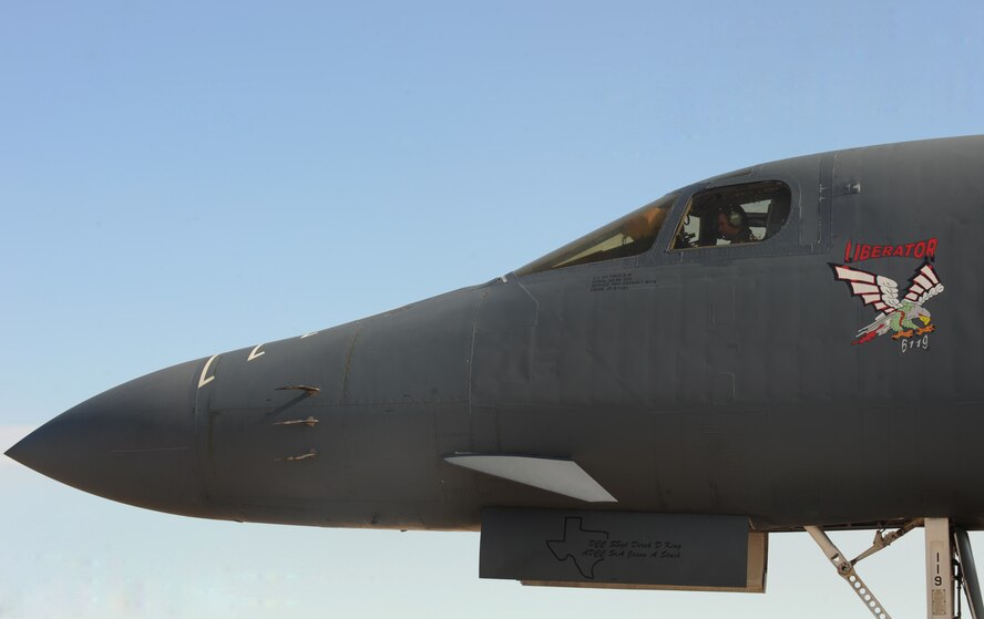 U.S. Air Force Maj. Peter Catsuliz, 345th Bomb Squadron pilot, prepares a B1-B Lancer for take-off at Dyess Air Force Base, Texas, May 11, 2017. For safety purposes, pilots must follow a pre-flight checklist before every take-off of the highly versatile, multi-mission weapon system. (U.S. Air Force photo by Airman Kylee Thomas)