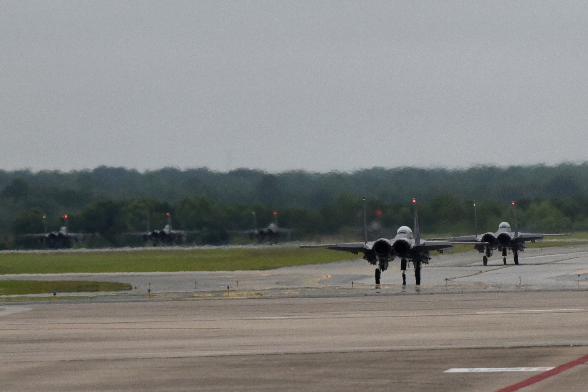 F-15E Strike Eagles taxi to the end of the runway during exercise Razor Talon, May 12, 2017, at Seymour Johnson Air Force Base, North Carolina. The monthly exercise allows pilots and weapon systems officers to conduct aerial training. (U.S. Air Force photo by Airman 1st Class Victoria Boyton)