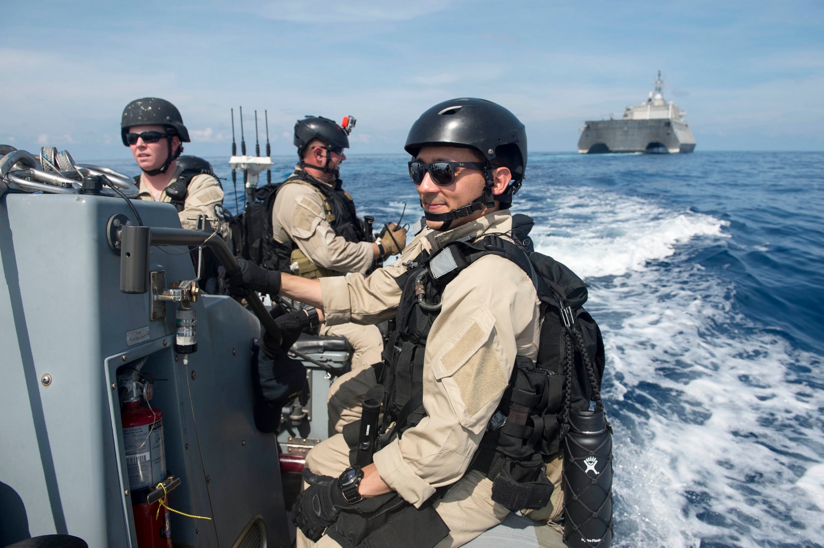 Sailors assigned to the visit, board, search and seizure team aboard littoral combat ship USS Coronado (LCS 4) prepare to board a Singaporean ship during the multilateral Cooperation Afloat Readiness and Training (CARAT) exercise, May 11, 2017. CARAT is a series of annual maritime exercises aimed at strengthening partnerships and increasing interoperability through bilateral and multilateral engagements ashore and at sea.