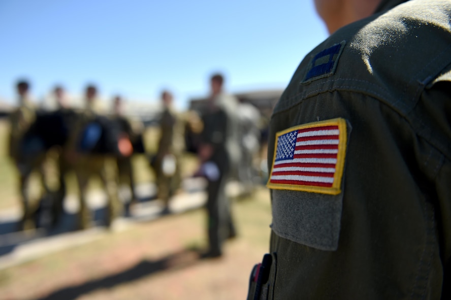 Members of the 40th Airlift Squadron line up to walk through the flight line entry control point at Dyess Air Force Base, Texas, May 6, 2017. The 40th AS will be replacing the 39th AS in Afghanistan to continue conducting tactical airlift missions. (Photo by U.S. Air Force Senior Airman Alexander Guerrero)