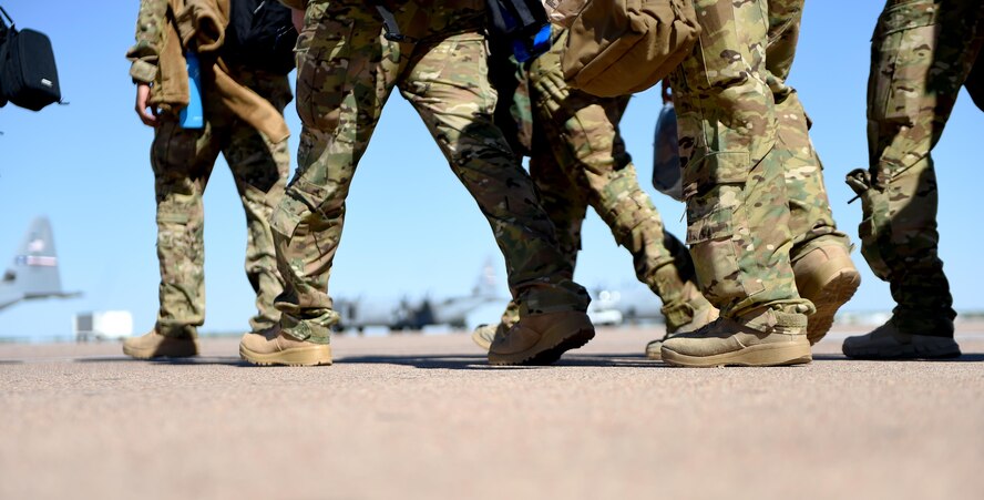 Members of the 40th Airlift Squadron step onto the flight line at Dyess Air Force Base, Texas, May 6, 2017.  40th AS Airmen were sent to Afghanistan to maintain combat-delivery and airlift capabilities for U.S and coalition forces in the region. (Photo by U.S. Air Force Senior Airman Alexander Guerrero)