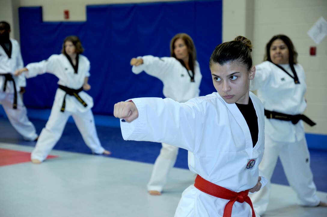 Tatiana Ayala, daughter of Carmen Perez and Rocket TKD student, delivers a power punch. Her mother is an employee with the U.S. Army Engineering and Support Center, Huntsville.