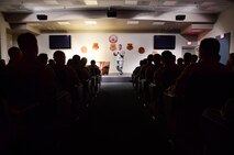 Senior Master Sgt. Michael, 99th Air Base Wing superintendent community support, shares his personal experiences during the first Storytellers event May 10, 2017, at Creech Air Force Base, Nev. Michael explained how his U.S. Air Force family helped him through his struggles after his daughter was diagnosed with depression and anxiety. (U.S. Air Force photo/Senior Airman Christian Clausen)
