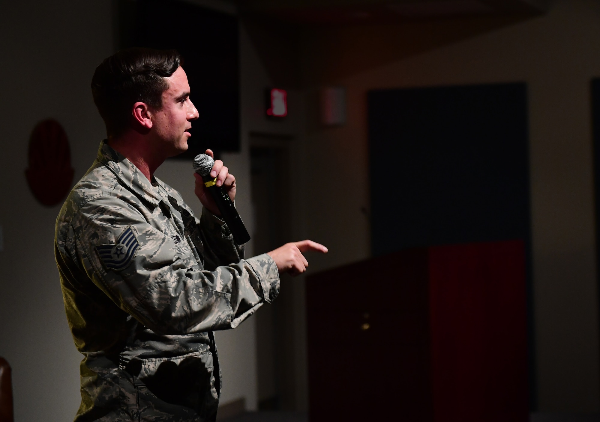 Tech. Sgt. Jimmy, 78th Attack Squadron intelligence analyst shares his personal experiences during the first Storytellers event May 10, 2017, at Creech Air Force Base, Nev. Jimmy broke 23 bones in a sky-diving accident when his parachute malfunctioned. Doctors told him he would never walk unassisted again. He now can walk and play sports and helps other work through their injuries. (U.S. Air Force photo/Senior Airman Christian Clausen)