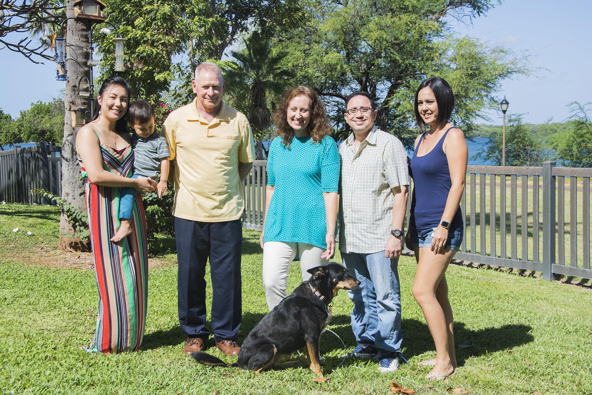 Key Spouses volunteers for the 624th Regional Support Group (L-R) Kelli Cole and Gary Mobley, both for the 624th Aeromedical Staging Squadron; Key Spouse Mentor Leslie Lute and Alberto Morales, both for the 624th Regional Support Group, and Napua Warnet for the 48th Aerial Port Squadron, gather for a group photo during a quarterly meeting at Joint Base Pearl Harbor Hickam, April 17, 2017. The Key Spouse program is designed to enhance readiness by connecting families of Airmen with their squadrons. The volunteers give back to the RSG community by providing information, resources and support to families as they balance civilian and military life. (U.S. Air Force photo by Master Sgt. Raquel Griffin)