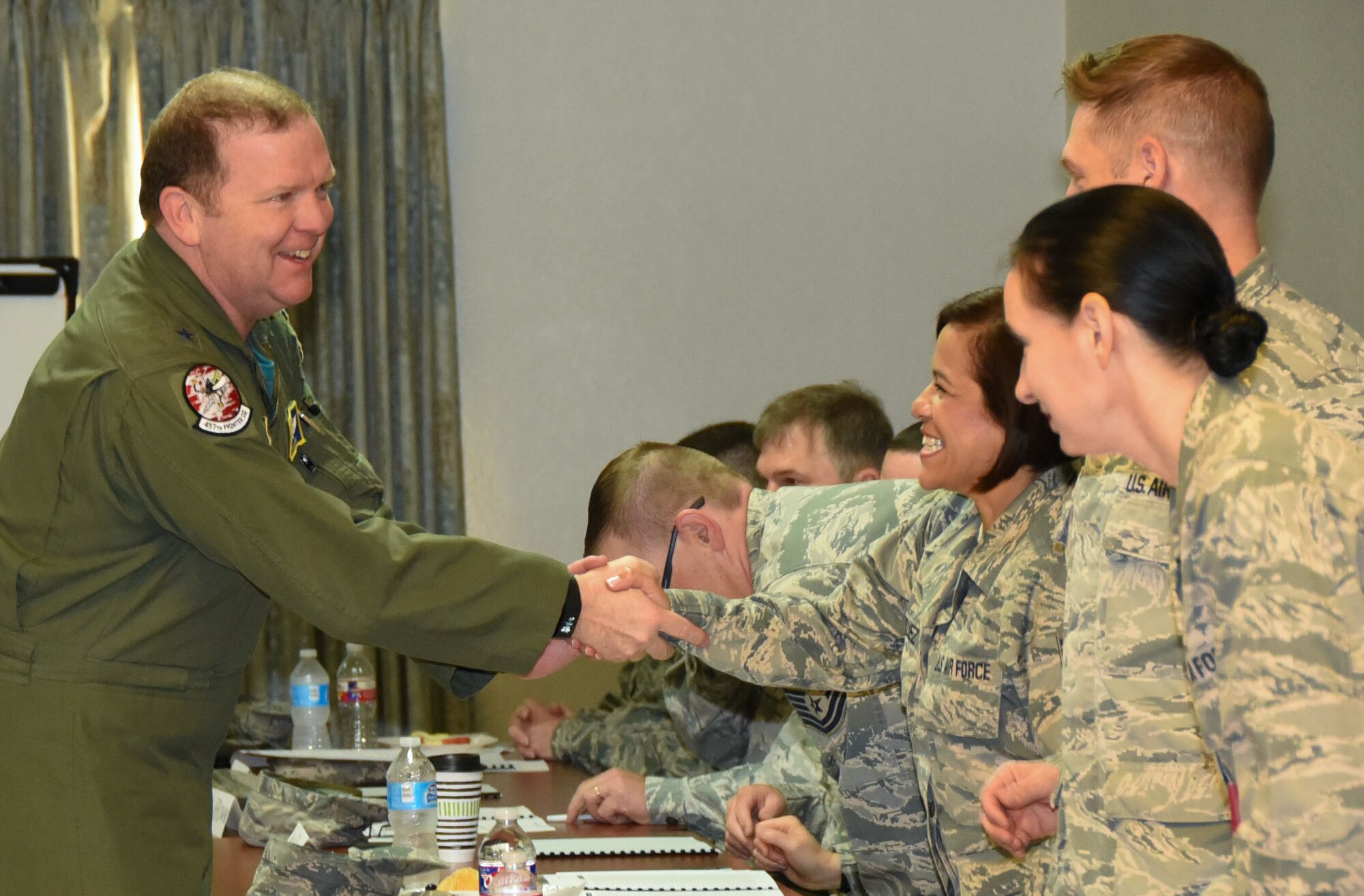 Tenth Air Force Commander Maj. Gen. Richard Scobee greets chaplain corps members from the 920th Rescue Wing, Patrick AFB, Fla., at Naval Air Station Fort Worth Joint Reserve Base, Texas, April 25, 2017. 10th AF chaplains and their assistants gathered here for the first training event specifically for them since the re-designation of the numbered Air Force in 1976. (U.S. Air Force photo by Tech. Sgt. Jeremy Roman)