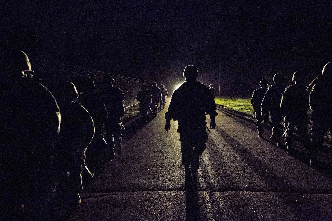 Marines conduct a six-mile training hike at Marine Corps Air Station Beaufort, S.C., May 10, 2017, to satisfy annual requirements and build unit cohesion. The Marines are assigned to Combat Logistics Company 23. Marine Corps photo by Lance Cpl. Christian E. Moreno