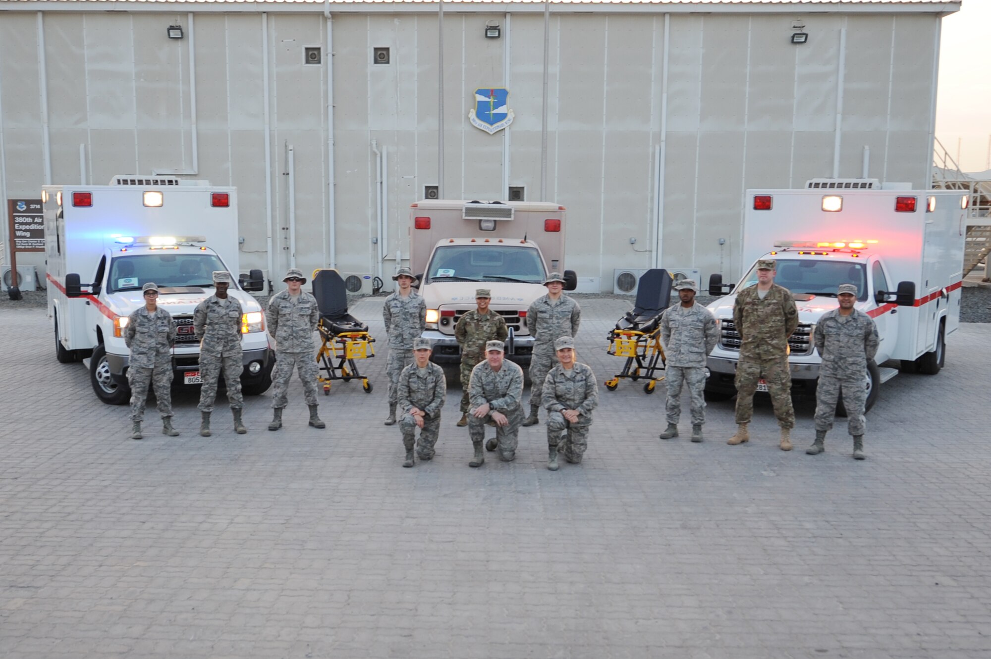 Members of the 380th Expeditionary Medical Group medical operations flight pose for a group photo at an undisclosed location in Southwest Asia, May 9, 2017. Nurses and med techs serve on the front lines against the invisible enemies that keep service members from accomplishing their mission. (U.S. Air Force photo by Staff Sgt. Marjorie A. Bowlden)