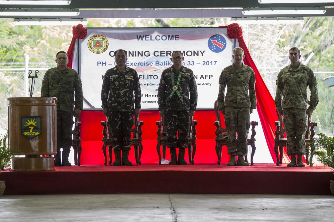 Philippine and U.S. military leaders stand during the opening ceremony of Balikatan 2017 at Fort Magsaysay in Santa Rosa, Nueva Ecija, May 8, 2017. Balikatan is an annual U.S.-Philippine bilateral military exercise focused on a variety of missions including humanitarian and disaster relief, counterterrorism, and other combined military operations.
