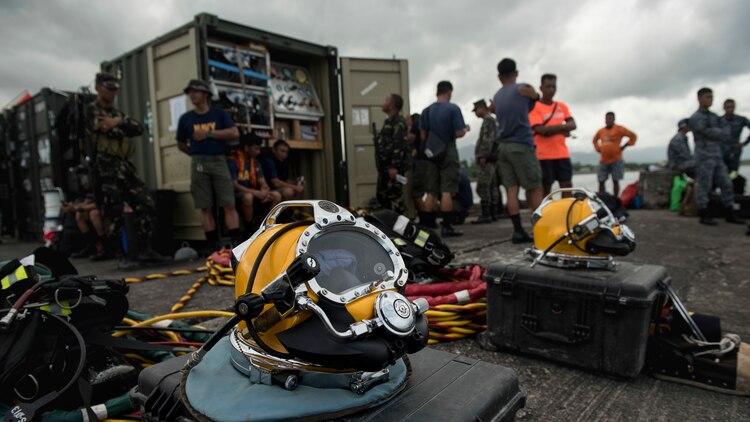 Philippine Sailors prepare for an underwater construction demolition dive in support of Balikatan 2017 at Ipil Port in Ormoc City, Leyte, May 10, 2017. The demolition training prepares the U.S. military and Armed Forces of the Philippines to clear debris in ports and open up supply lines for victims of natural disasters and crises. Underwater demolition can help Philippine and U.S. forces provide humanitarian assistance and disaster relief operations from the sea to remote areas of the Philippines. 
