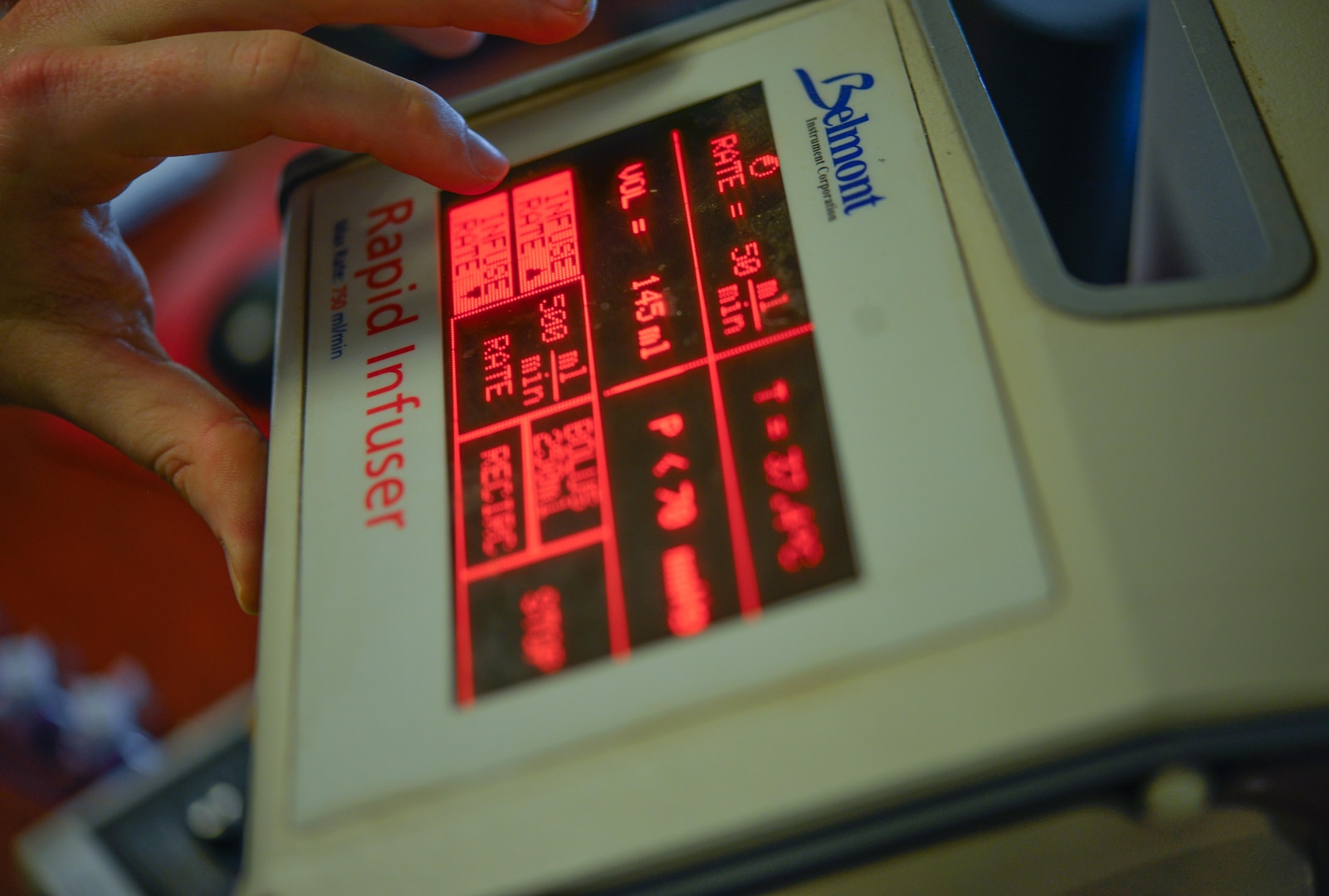 Staff Sgt. Ryan McGinniss, a biomedical equipment technician with the 332nd Expeditionary Medical Group, checks the calibration of a high-volume blood infusion pump unit May 9, 2017, in Southwest Asia. McGinnis is the only biomedical equipment technician for the last Expeditioanry Medical Support System installation supporting joint and  coalition members deployed to Operation Inherent Resolve.  (U.S. Air Force photo by Staff Sgt. Alexander W. Riedel)