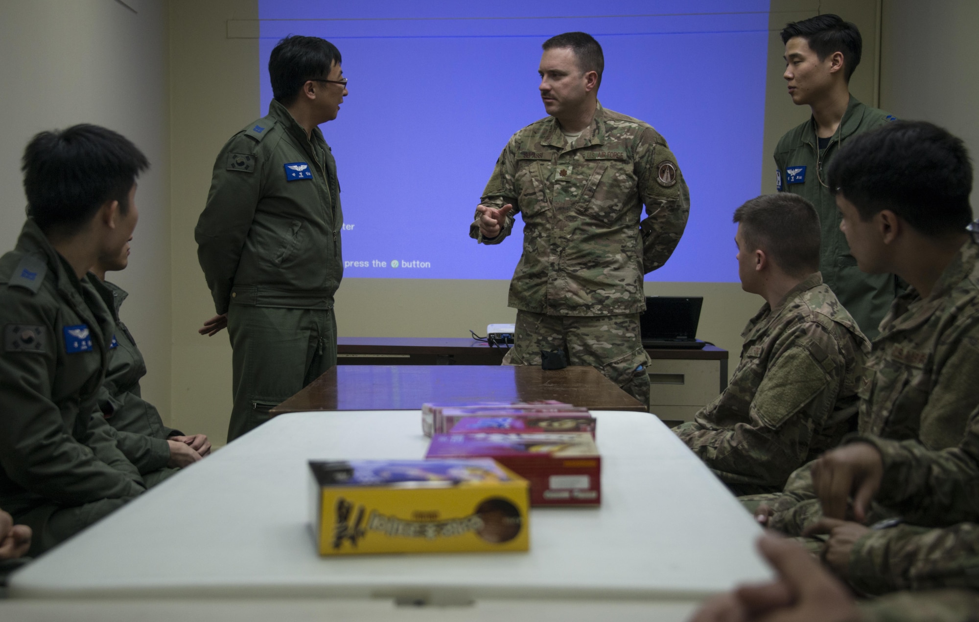 A U.S. Air Force 353rd Special Operations Maintenance Squadron maintenance operations officer conducts a unit-to-unit exchange with maintainers from the Republic of Korea 255th Special Operations Squadron, March 27, 2017 at Daegu Air Base, ROK. Foal Eagle 2017 provided the opportunity for targeted tactical exchanges focused on further developing interoperability with counterparts from the ROK military. (U.S. Air Force photo by Capt. Jessica Tait)