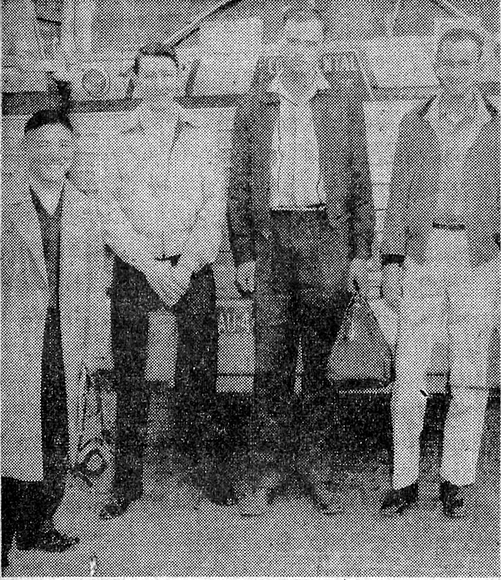 Tatsuo “Jimmy” Schwartz (left) stands in front of a bus with other U.S. Army recruits before leaving for Fort Leonard Wood, Mo. Schwartz served in the Army as a designer and photographer before becoming a Department of Defense civilian employee.