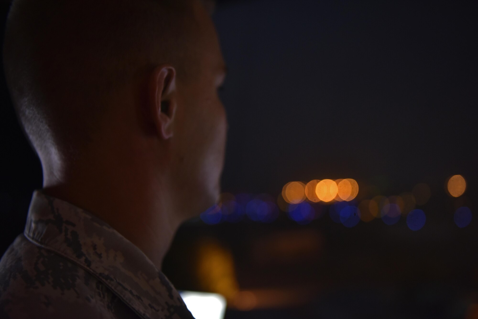 Staff Sgt. Jason Henry, 407th Expeditionary Operation Support Squadron air traffic controller, watches operations on the airfield May 8, 2017, in Southwest Asia. The mission of ATC members at the 407th Air Expeditionary Group is to maintain safety and to provide instructions to U.S. Marine Corps and coalition force operations in the air and on the ground. (U.S. Air Force photo by Senior Airman Ramon A. Adelan) 