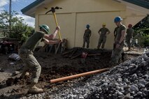 U.S. Marines dig a drainage ditch during an engineering civic assistance project in support of Balikatan 2017 in Ormoc City, Leyte, May 12, 2017. Philippine and U.S. service members worked together to build new classrooms for students at Don Carlos Elementary School. Balikatan is an annual U.S.-Philippine bilateral military exercise focused on a variety of missions, including humanitarian assistance and disaster relief, counterterrorism, and other combined military operations. 