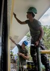 Philippine Army Pfc. Socrates Boyles, right, and U.S. Marine Cpl. Quentin Newton repair walls during an engineering civic assistance project in support of Balikatan 2017 in Ormoc City, Leyte, May 12, 2017. Philippine and U.S. service members worked together to build new classrooms for students at Don Carlos Elementary School. Balikatan is an annual U.S.-Philippine bilateral military exercise focused on a variety of missions, including humanitarian assistance and disaster relief, counterterrorism, and other combined military operations. 