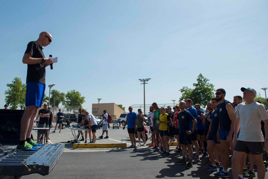 U.S. Air Force Lt. Col. William Smith (left), commander, 39th Security Forces Squadron, speaks to members of the 39th Air Base Wing during the opening ceremony for Police Week 2017, May 13, 2017, at Incirlik Air Base, Turkey. National Police Week began in 1962 after President John F. Kennedy signed a proclamation designating May 15 as Peace Officers Memorial Day and the week in which that date falls as Police Week. (U.S. Air Force photo by Airman 1st Class Devin M. Rumbaugh) 