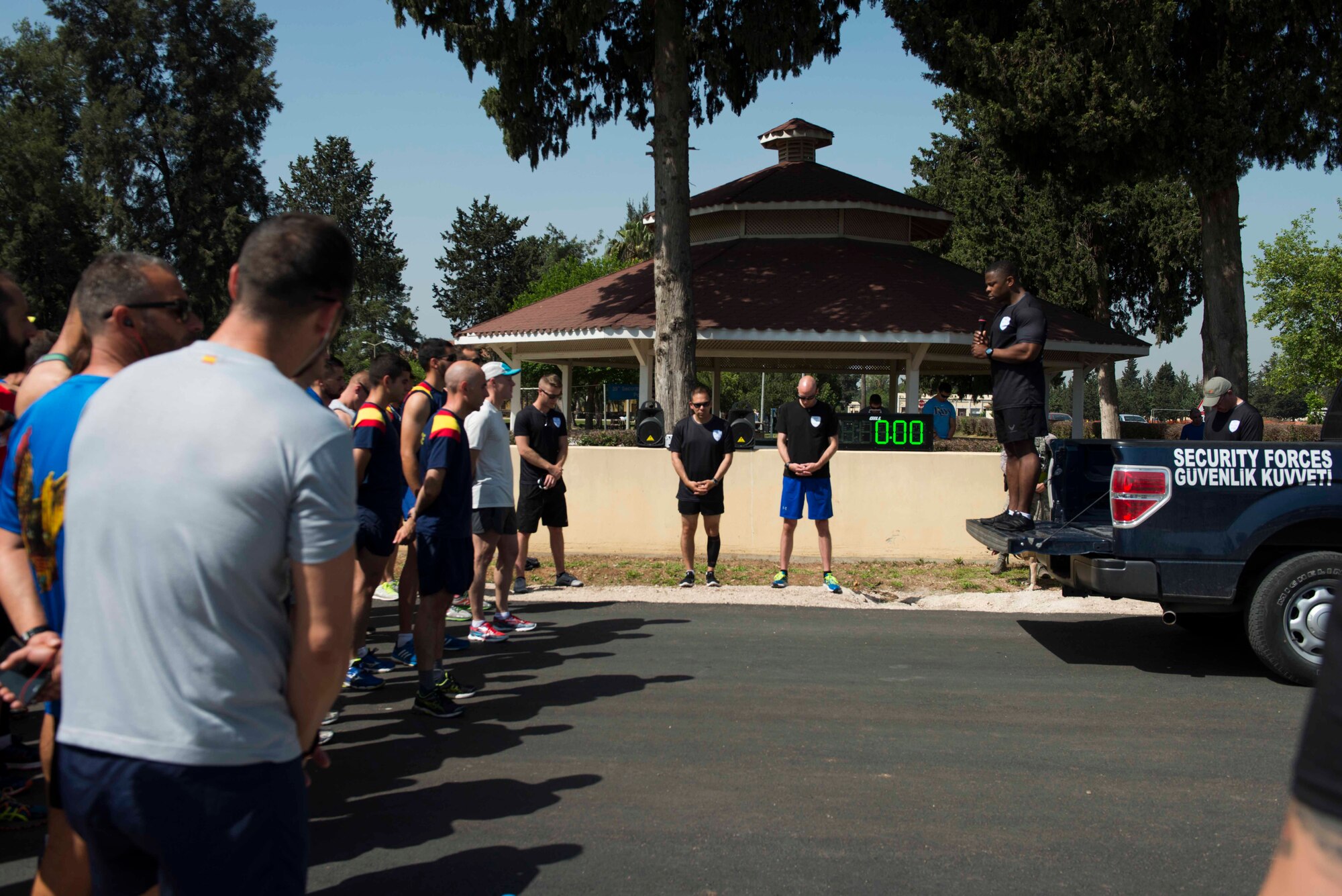 U.S. Air Force Master Sgt. Phillip Peterkins, 39th Security Forces Squadron Training NCO in charge, leads a prayer during the opening ceremony of Police Week 2017, May 13, 2017, at Incirlik Air Base, Turkey. National Police Week began in 1962 after President John F. Kennedy signed a proclamation designating May 15 as Peace Officers Memorial Day and the week in which that date falls as Police Week. (U.S. Air Force photo by Airman 1st Class Devin M. Rumbaugh)