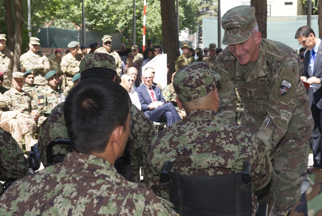KABUL, Afghanistan (April 12, 2017) — General John Nicholson, Resolute Support commander, greets wounded Afghan warriors who participated in the final team selection trials for the Invictus Games Toronto 2017. 

“You have been tested and you prevailed, right alongside your comrades, your brothers. In particular, the Afghan Army has excelled over the last few years, fighting in a war that would break most armies; yet, it continues to spring up with a warrior spirit; fighting for what is right and just,” Nicholson said.

(U.S. Navy photo by Lt. j.g. Egdanis Torres Sierra, Resolute Support Public Affairs – Afghanistan)
