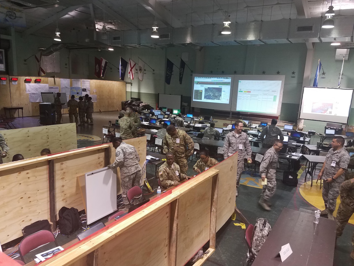 Virgin Islands National Guard service members and visiting Title 32 and Title 10 forces plan and coordinate operations in the joint operations center at the Leonard B. Francis Readiness Center on St. Thomas, VI, May 14, 2017. The JOC will serve as the main operations hub for Vigilant Guard 17-03, a disaster response exercise hosted by VING and U.S. Northern Command.
