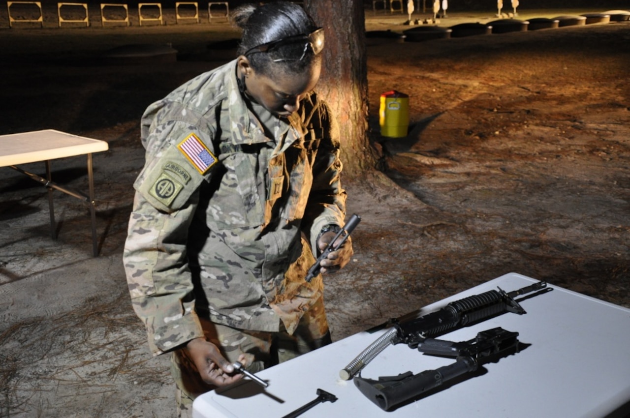 Army Capt. Octavia Blackwell conducts weapons assembly during the Best Civil Affairs Team competition at Fort Bragg, N.C., March 6, 2017. Army photo by Maj. Bryen C. Freigo
